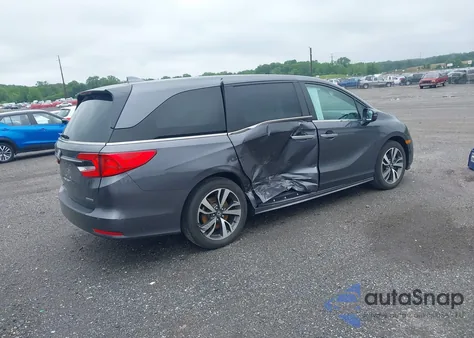 2023 Honda Odyssey Touring z USA, uszkodzony, nr VIN 5FNRL6H87PB019264